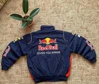 Back view of navy classic motorsport jacket with large embroidered Red Bull logo and sponsor patches