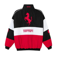 Back profile of the red and black F1 bomber jacket highlighting the relaxed streetwear silhouette.