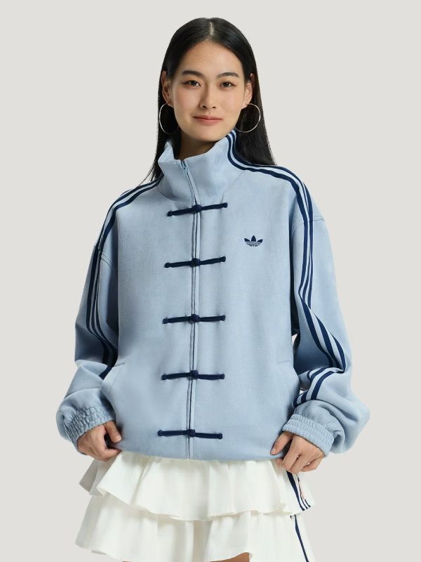 Front view of Uibok aqua blue CNY jacket, the standout piece from our Lunar New Year clothing collection 2026