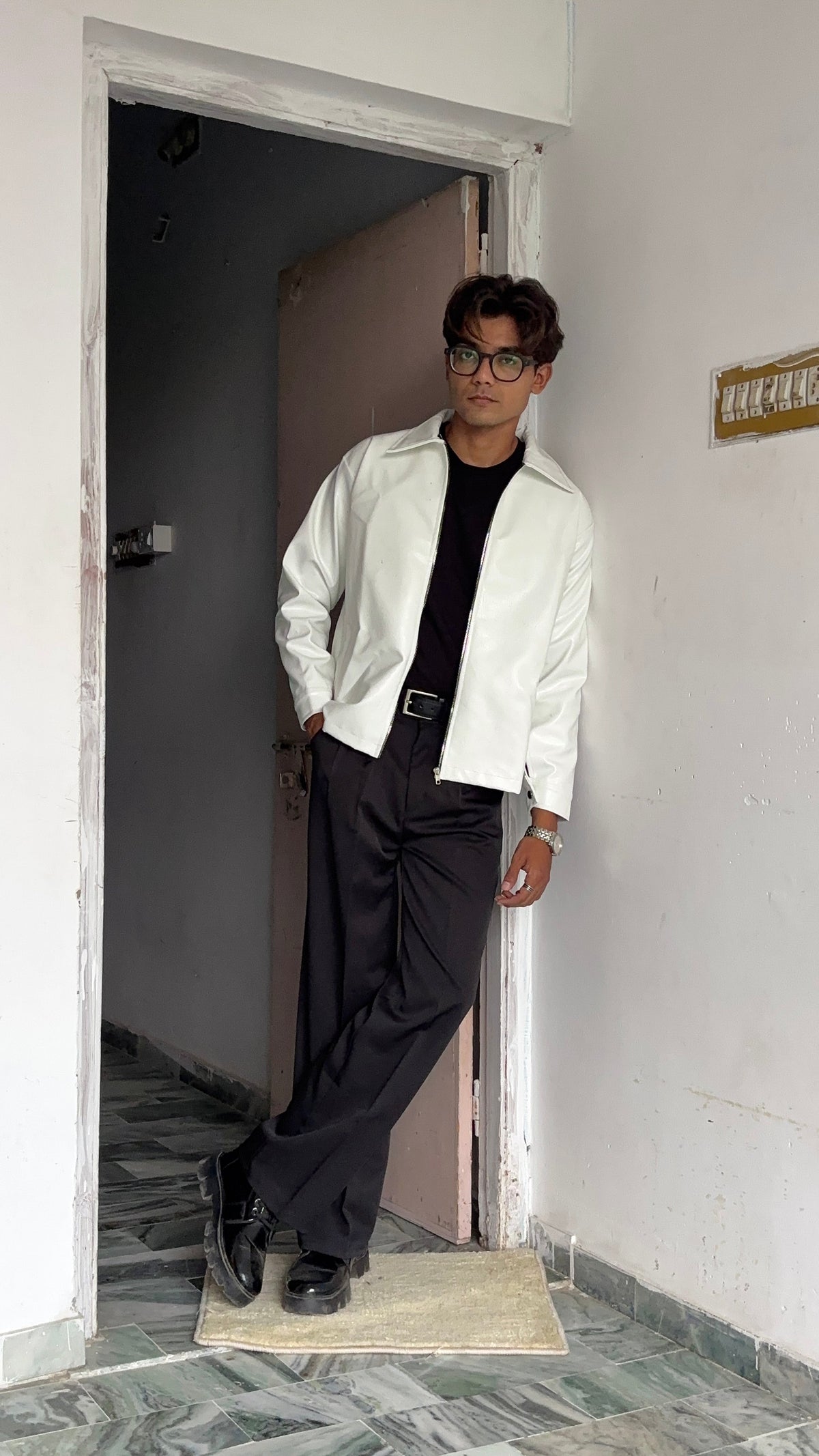 High-quality texture detail of the w PU white leather jacket, available to buy white faux leather jacket online India safely