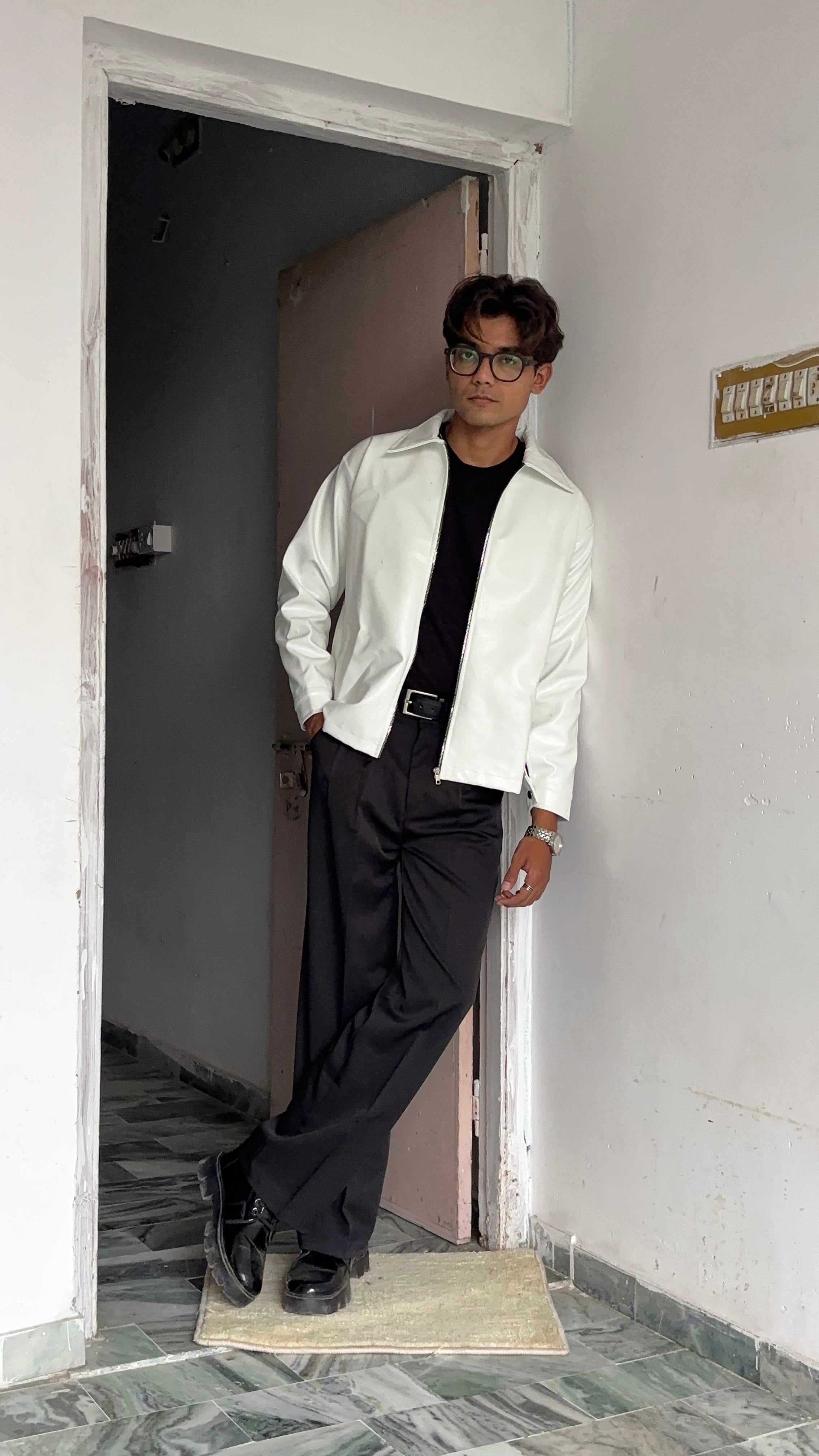 High-quality texture detail of the w PU white leather jacket, available to buy white faux leather jacket online India safely