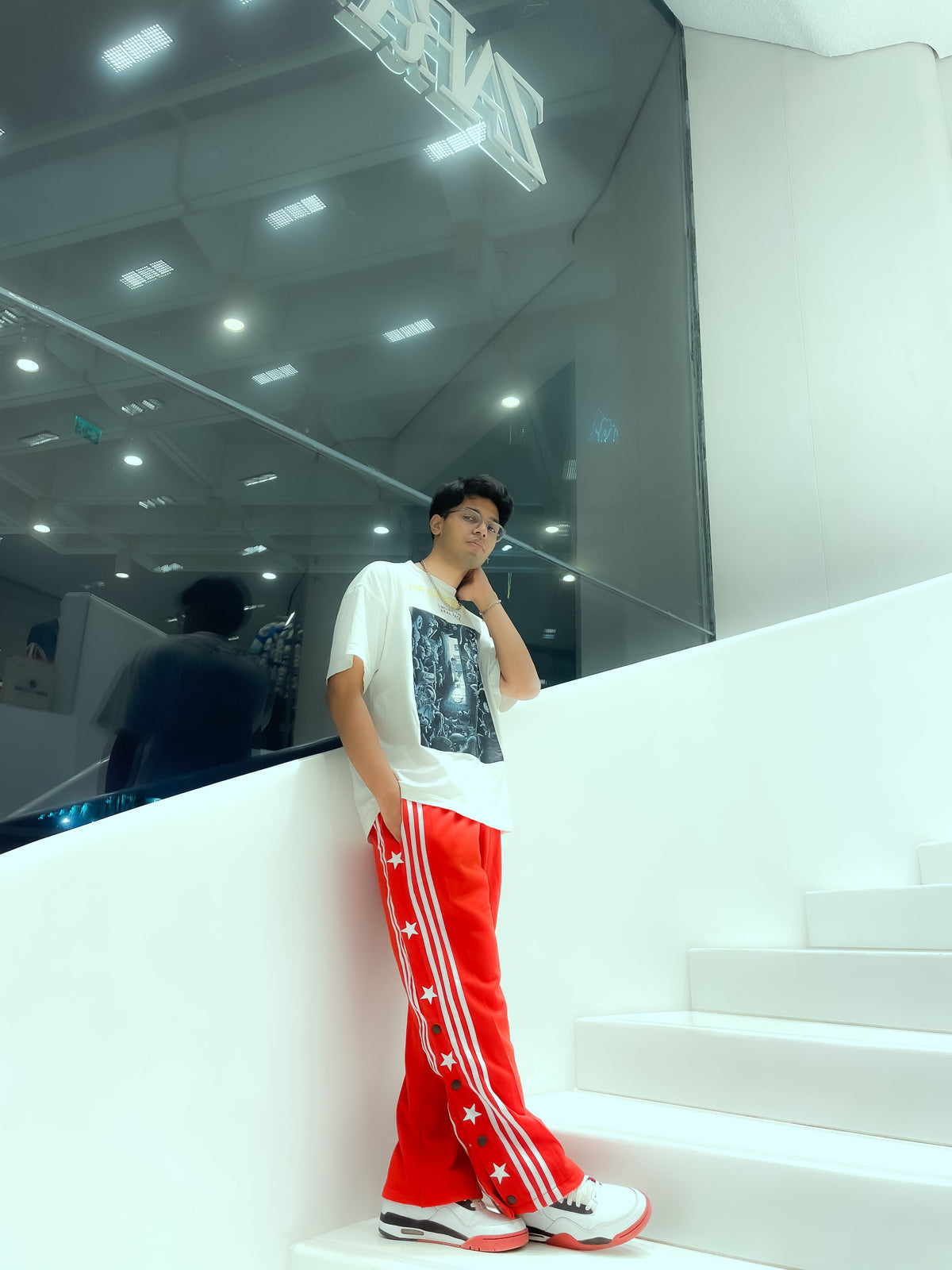 Lifestyle shot of a person walking, showcasing the movement and tech-twill drape of Uibok 90s style breakaway pants.