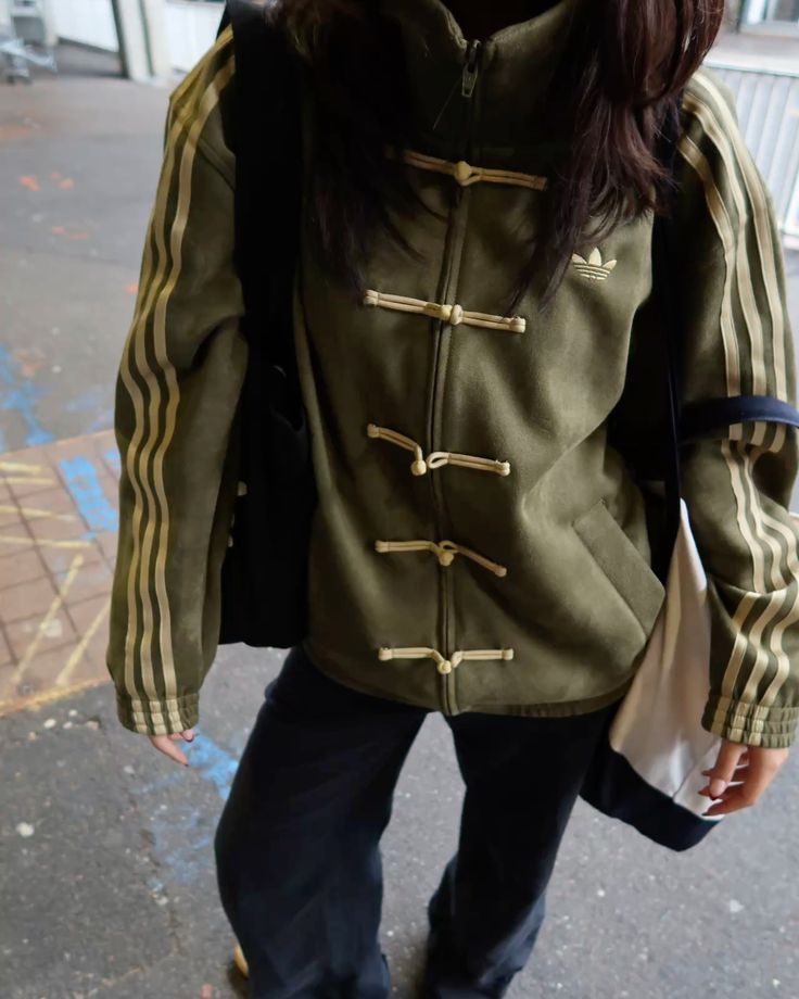Showcasing the boxy relaxed fit of the Uibok Greens Lunar New Year outerwear