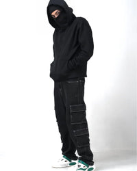 Side profile of Uibok heavyweight distressed urban hoodie showing the structural boxy silhouette and dropped shoulders.