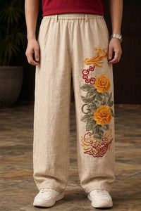 Chinese baggy pants for unisex with yellow peony 3D embroidery on beige fabric by Uibok Studio.