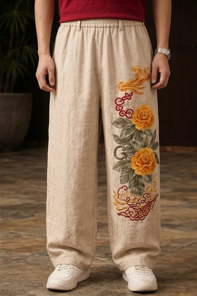 Chinese baggy pants for unisex with yellow peony 3D embroidery on beige fabric by Uibok Studio.