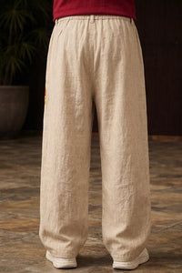 Uibok Studio premium embroidered baggy trousers featuring ancient Chinese art inspired floral patterns.