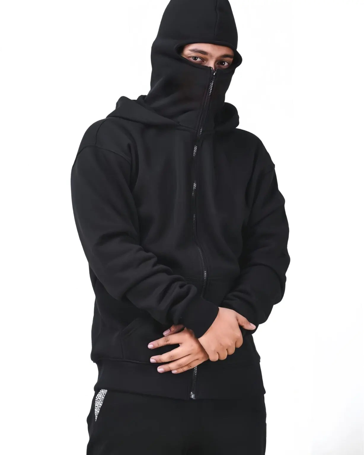 Close-up of Uibok integrated facial coverage sitting flush against the collar for a minimalist subterranean streetwear look.