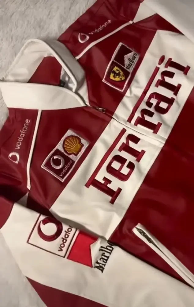 Red and white vintage motorsport jacket with embroidered racing patches and two-tone color blocking